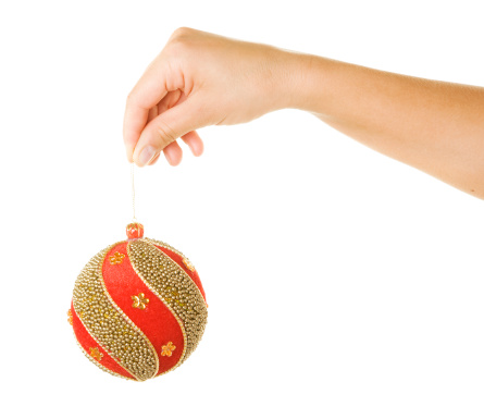 Hand holding Christmas Bauble. Isolated on white. Please take a look at my Lightbox CHRISTMAS: