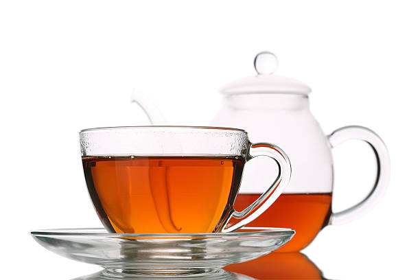 Full Tea Cup and Half Glass Pot