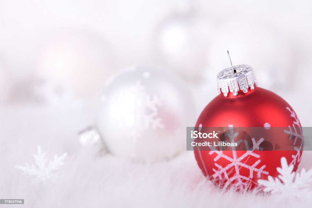 Snowflake Baubles on a fluffy background (XXL) A red Christmas ball on a fluffy background with snowflake ornaments. Backgrounds Stock Photo