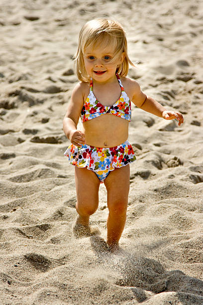 istock Small girl having fun at the beach 173037761