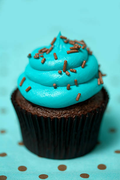Cupcake in blue stock photo