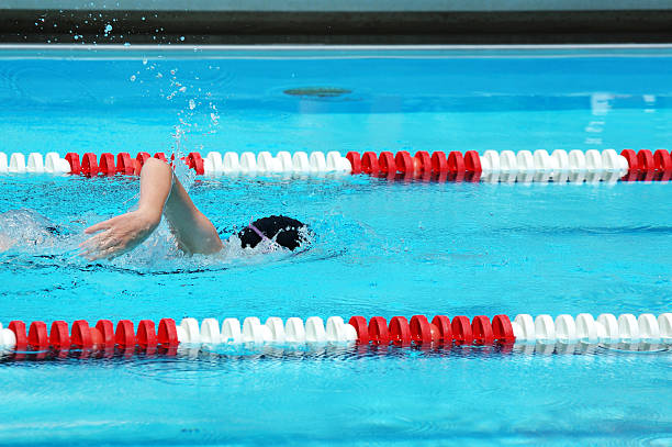istock Young Boy Swimming Front Crawl Freestyle in Race 173038315