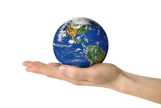 istock Earth in female hand isolated on white 173038374