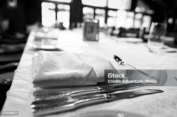 Wedding Dinner Table Setup Of Dishes Glasses And Silverware Stock Photo - Download Image Now