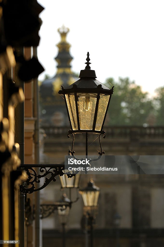 Lantern in Dresden Old Town with Zwinger background. Backgrounds Stock Photo