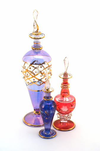 three oriental perfume bottles isolated