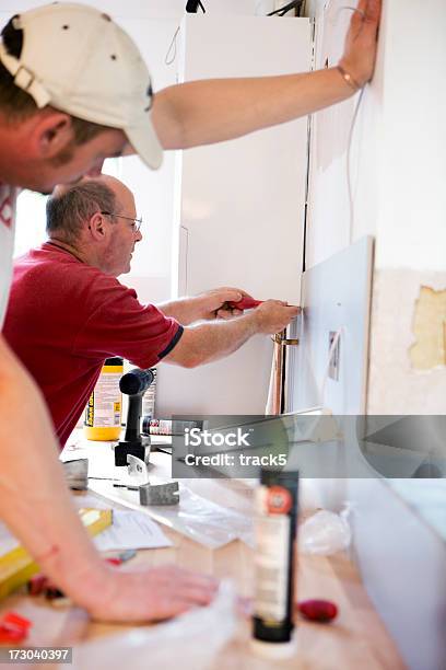 Compagni Di Lavoro - Fotografie stock e altre immagini di Imprenditore edile - Imprenditore edile, Interno di casa, Costruire