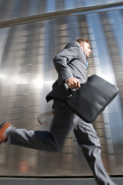 istock Businessman Rushes By in a Blur 173040835