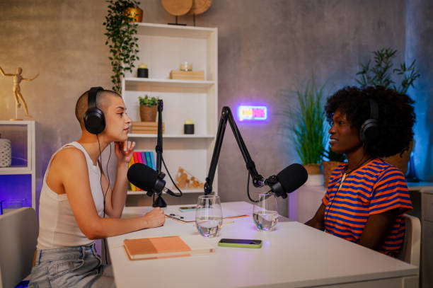 istock A journalist is sitting in a home recording studio and going live on air 1730409146