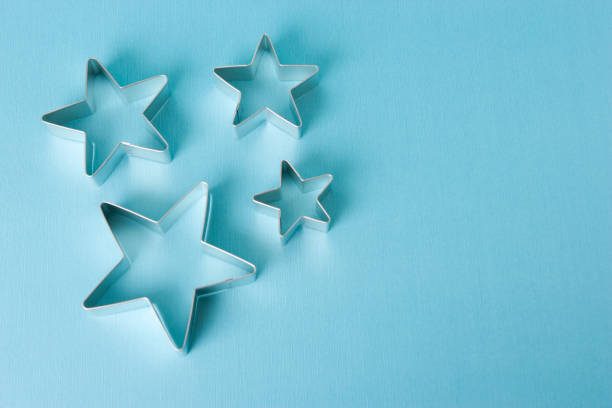 istock Star cookie cutter outline on blue 173041431