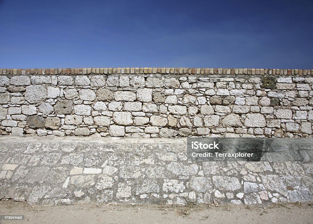 Stone Wall "Old ruins of a fortress wall, Corfu, Greece" Ancient Stock Photo