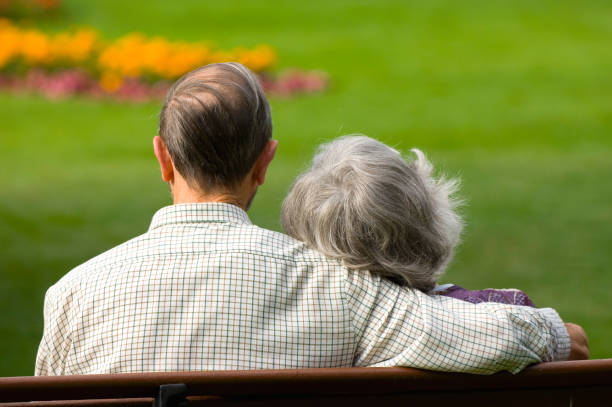istock Senior couple on park bench 173041563