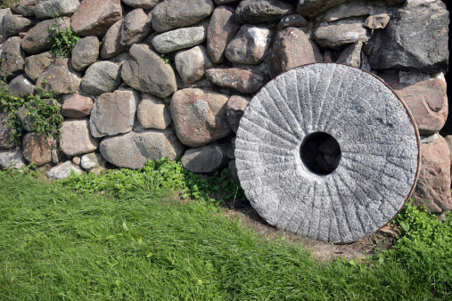 Millstone from old mill.Please see some similar pictures from my portfolio: