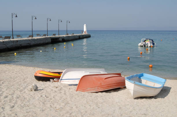 istock boats, left by the sea 173042251