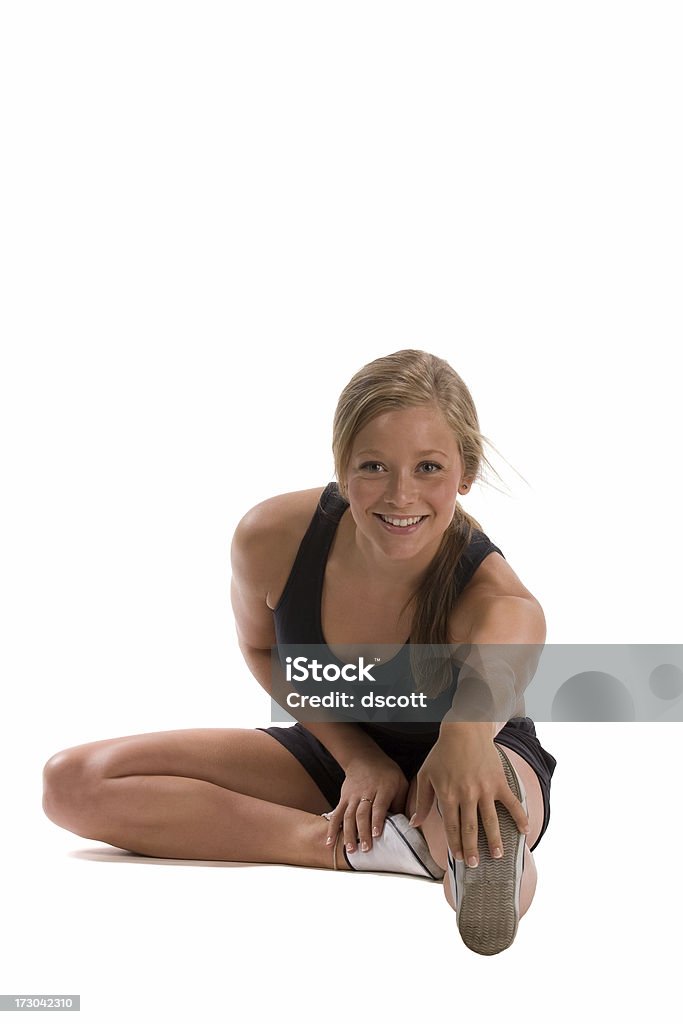 Workout Stretch Young woman stretches before her workout Active Lifestyle Stock Photo