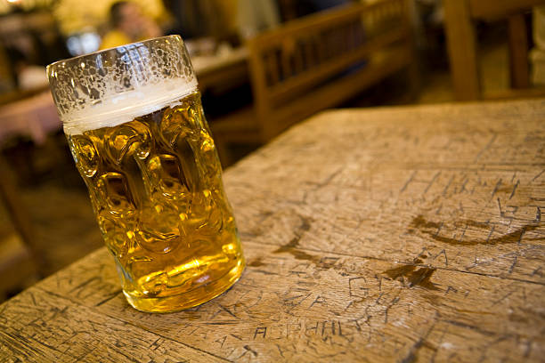 istock Mug of beer on a pub table 173042380