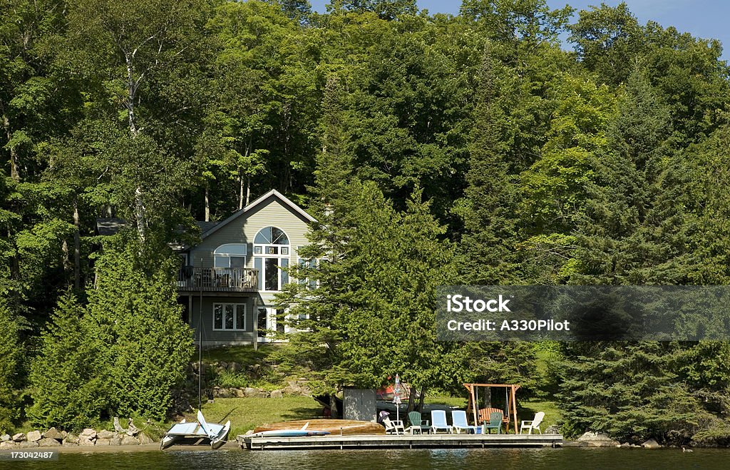 Luxury Home Luxury home on a lake. Lake Stock Photo