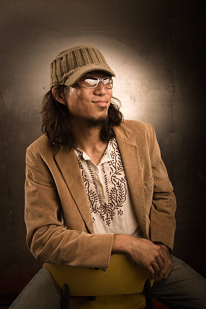 Hip Young Asian Man Hip young Asian man corduroy jacket stock pictures, royalty-free photos & images