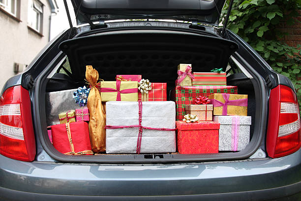Car boot filled with Christmas presents stock photo