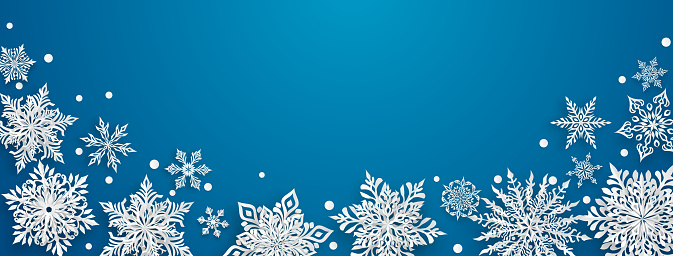 Christmas illustration with beautiful complex paper snowflakes, white on blue background