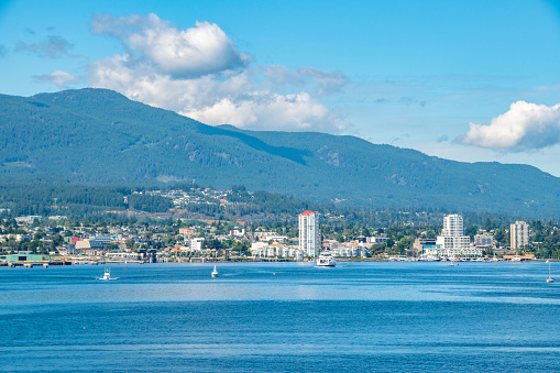 Big blue skies over Nanaimo Bay and its beautiful coastal city off the Strait of Georgia in BC, Canada.
