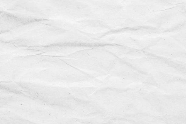 istock Abstract white crumpled and creased recycle paper texture background 1730552060