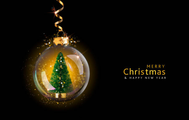 Transparent golden ball with Christmas tree inside on black background