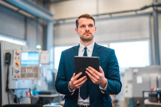 istock Portrait Of A Handsome Male Engineer Using A Digital Tablet 1730567095