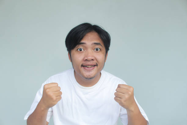 istock Asian man with happy and excited expression and looking at camera. 1730629927