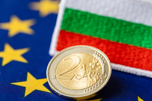 adoption of the Euro by Bulgaria, joining the euro zone, economic concept, euro coins, Bulgarian money, flag of Bulgaria and the European Union