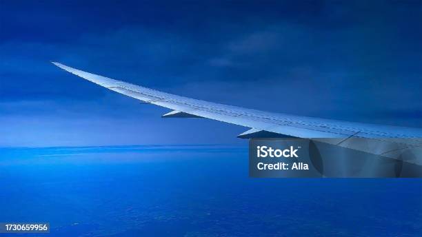 Flying Wing In The Sky Stock Photo - Download Image Now - Above, Air Vehicle, Aircraft Wing