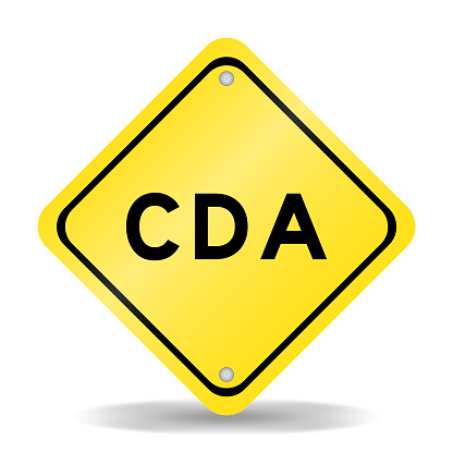 Yellow color transportation sign with word CDA (Abbreviation of Confidential disclosure agreement) on white background