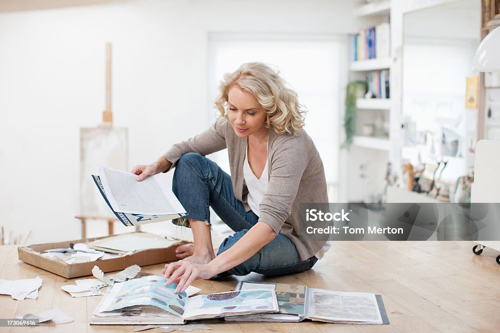 Woman with photograph album and scrapbook  Photo Album Stock Photo