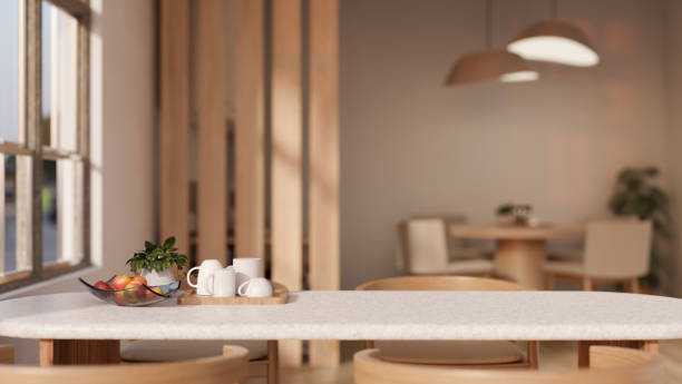 istock Copy space on a dining table in a cosy Scandinavian dining room in a cafe or restaurant. 1730723178