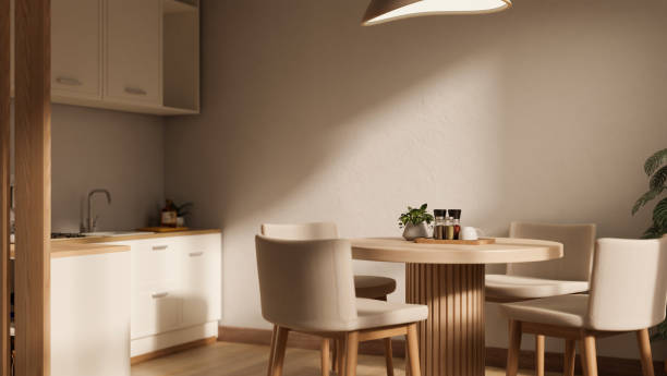 istock A minimal Scandinavian apartment kitchen with kitchen appliances and a dining table. 1730723179