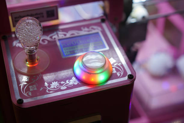 istock kid play claw game in asia arcade for hapiness and fun 1730740308