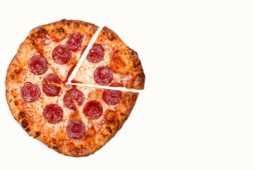 Pepperoni pizza sliced on white background