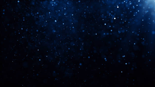 istock Particles Blue dust abstract light bokeh motion titles cinematic background 1730750341