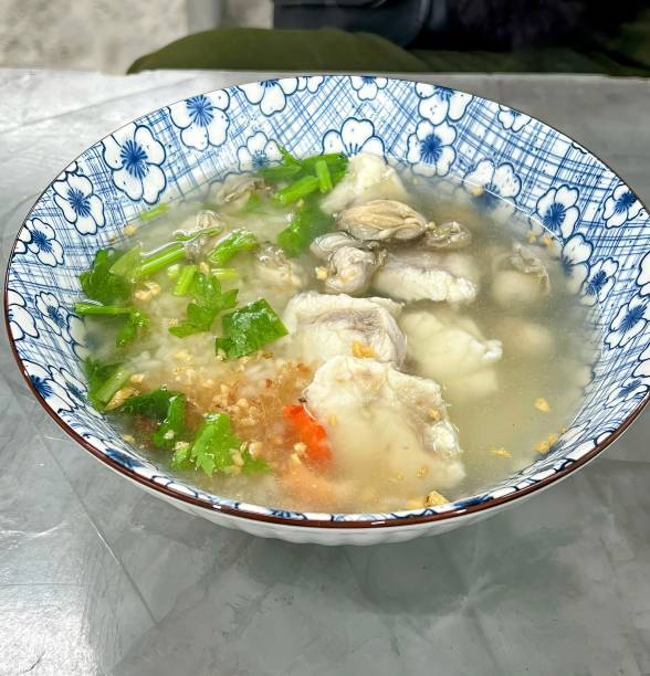 istock a bowl of soup with a blue and white bowl. 1730813202