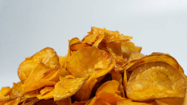 istock Spicy potato chips with balado topping isolated on white background 1730830089