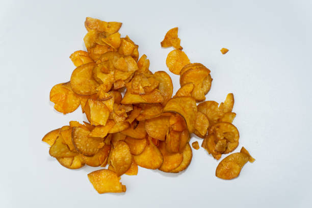 istock Spicy potato chips with balado topping isolated on white background 1730836299