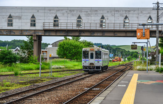 Furano, Japan - Jul 1, 2019. Small train at the countryside of Furano, Japan. Furano is one of Hokkaido most famous summer destinations.