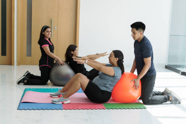 istock Young couple doing prenatal exercises together 1730879119