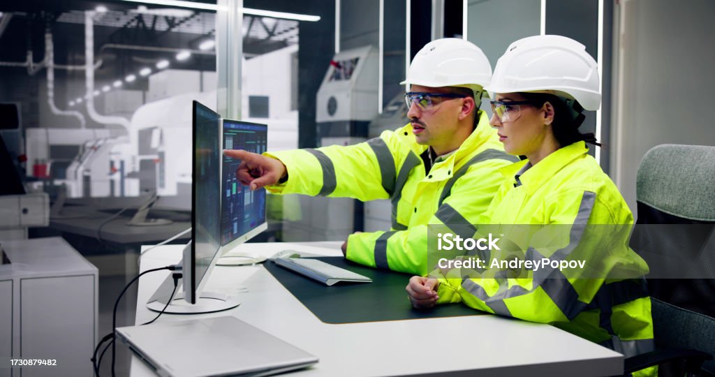 Engineer Operator Shape Engineer Operators Using Scada System Stock Photo - Download Image Now ...