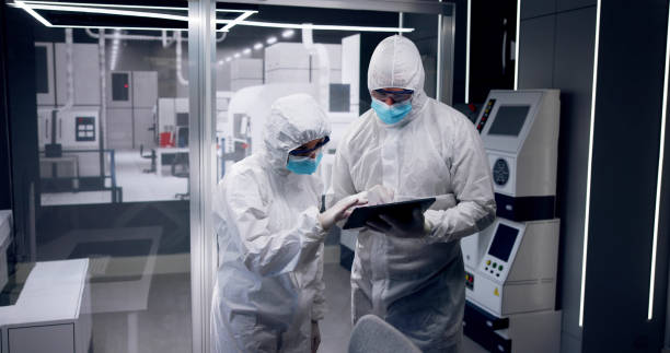 istock Sterile Semiconductor Manufacturing Factory And Workers 1730879488