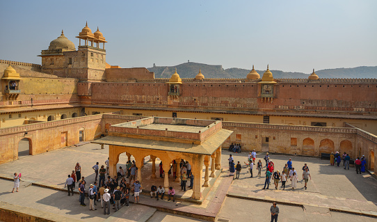 Jaipur, India - Nov 3, 2017. People at Amber Fort in Jaipur, India. Nostalgic Amber Fort is one of the most well-known and most-visited forts in India.
