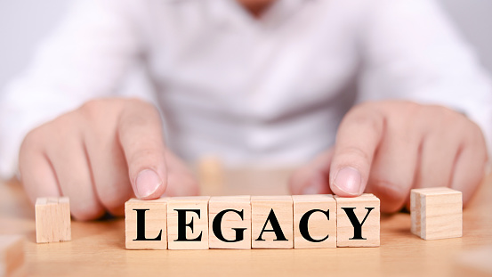 Legacy, text words typography written with wooden letter, life and business motivational inspirational concept