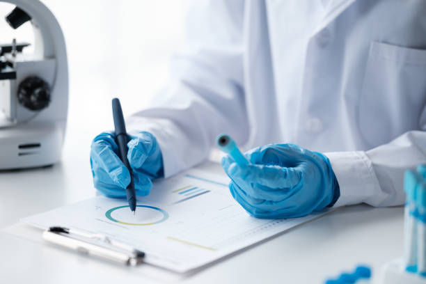 istock Scientist analyze biochemical sample in advanced scientific laboratory. Medical professional check chemical mix microbiological developmental of viral. Biotechnology research in science lab. cosmetic 1730909712