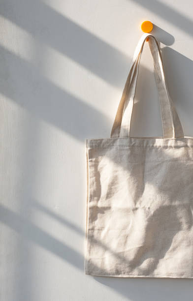 istock Textile shopping bag hanging from hook. 1730934902