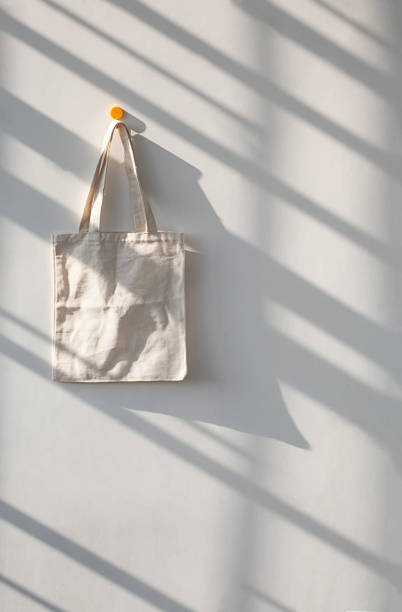 istock Textile shopping bag hanging from hook. 1730936470